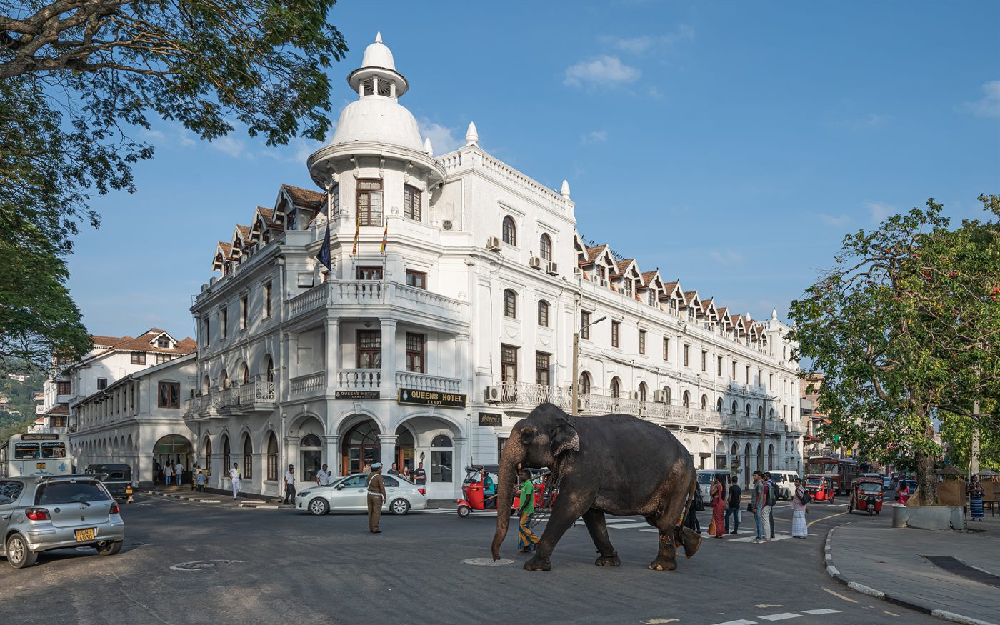 Kandy city scene with Queens Hotel and central traffic in Sri Lanka